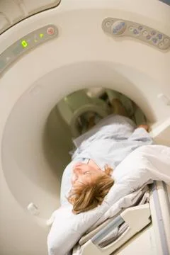 Patient undergoing for a computerized axial tomography (cat) scan 스톡 사진