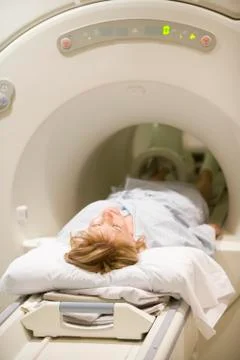 Patient undergoing for a computerized axial tomography (cat) scan 스톡 사진