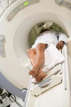 Patient undergoing for a computerized axial tomography (cat) scan 스톡 사진