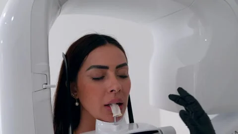 Patient undergoing dental x ray scan in modern clinic Stock Footage 306061335