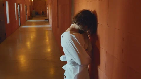 Patient Wearing Straitjacket In Asylum Corridor Stock Footage 252067337