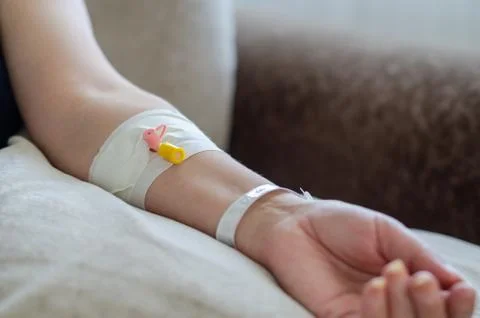 Patients hand with an IV Stock Photos