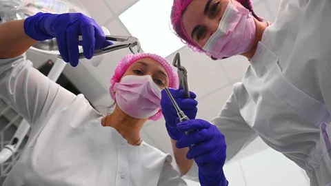 Patient's view at dentists with instruments for dental treatment, lean over to Stock Footage 231009450