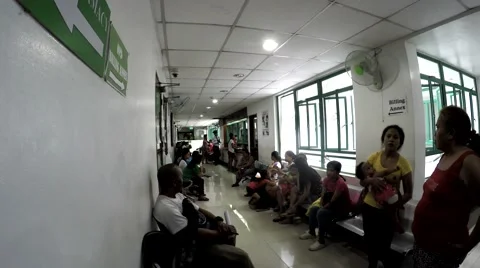 Patients waiting in queue at hospital lobby Video stock 67193096