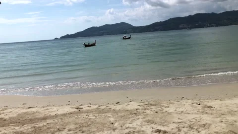 Patong Beach, Phuket. 2 Long Tail Boats Off Shore. Vídeo Stock 181663212