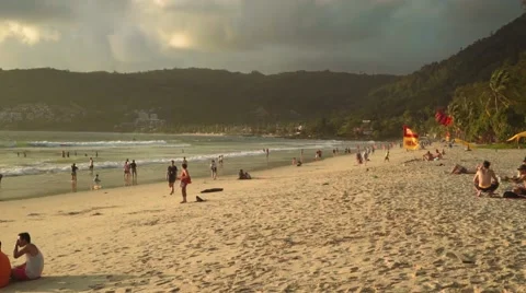 Patong Phuket beach with dark clouds and yellow sunlight - before the rain Stock Footage 65282299