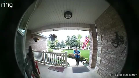 Patriotic Delivery Driver Fixes Tangled Flag, Mountain Green, Utah, USA - 13 May Stock Footage 309877236