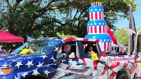 Patriotic parade float with cake and aircraft models Video stock 340941733