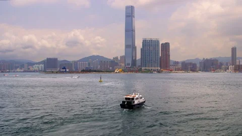 PATROL BOAT ICC TOWER KOWLOON HONG KONG CHINA Stock Footage 76651453