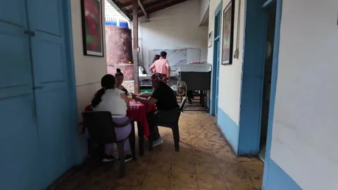 Patrons Dining at Historic Casa de Chila Gamboa Restaurant Interior in Cali Stock Footage 337005324