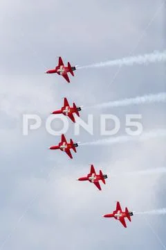 Patrouille Suisse banking away in formation Stock Photos
