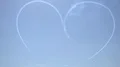 Patrulla Águila with CASA C 101 Aviojet flying writing a love heart in blue sky HD Footage