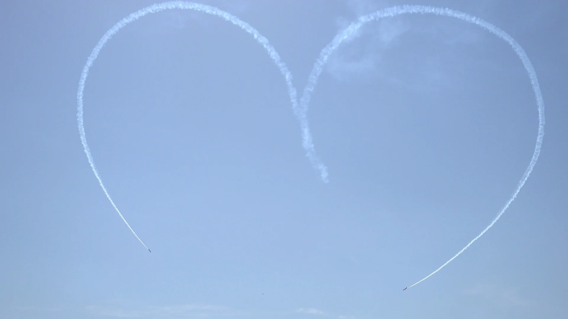 Patrulla Aguila With Casa C 101 Aviojet Flying Writing A Love Heart In Blue Sky Clip