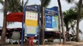 Pattaya beach noticeboard and tourists. HD Footage