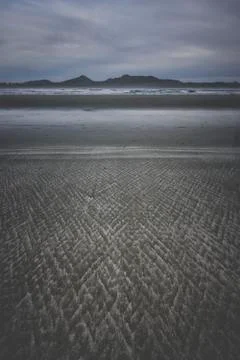 Patter in the sand on the beach Stockfoto's