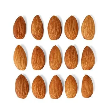 Pattern of almond nuts lying exactly square in white table. Healthy eating,.. Stock Photos