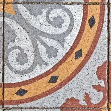 Pattern on an ancient square paving tile Stock Photos