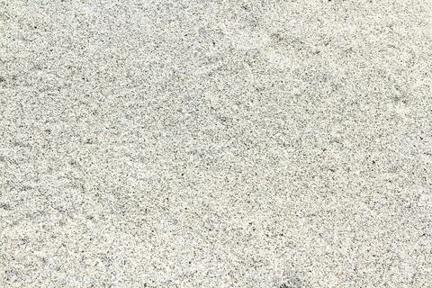 Pattern and surface gray sand on the tropical beach. Stock Photos