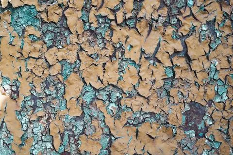 Pattern and texture of old dried paint on rusty metal surface Stock Photos