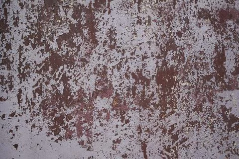 Pattern and texture of old dried paint on a rough metal surface Stock Photos