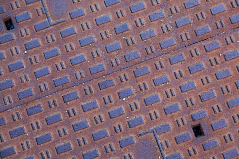 Pattern and texture on well cap in Uppsala Stock Photos