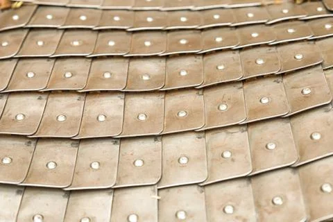 Pattern army protective uniform of medieval warrior leather background with Foto stock