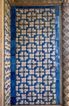Pattern of azulejo tiles on wall with feather shapes Stock Photos