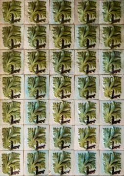 Pattern of azulejo tiles on wall with plants and herbs Stock Photos