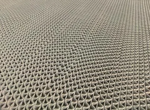 Pattern background of grey rubber foot mat wavy design texture or real object at Stockfoto's