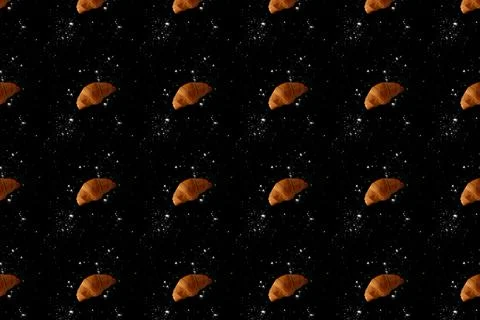 Pattern of baked croissants with a black background. Delicious pastries Stock Photos