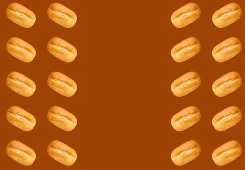 Pattern with a baked loaf on a brown background. Baguette. Stock-Fotos