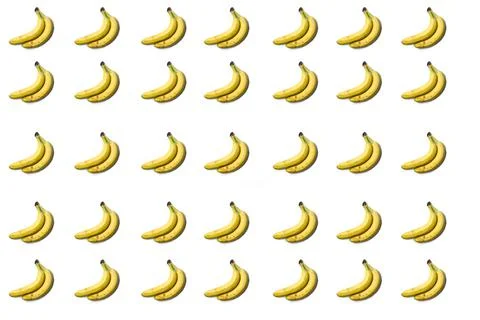 A pattern of bananas on a white background, a bunch of bananas. Stock Photos