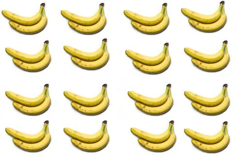 A pattern of bananas on a white background, a bunch of bananas. Stock Photos