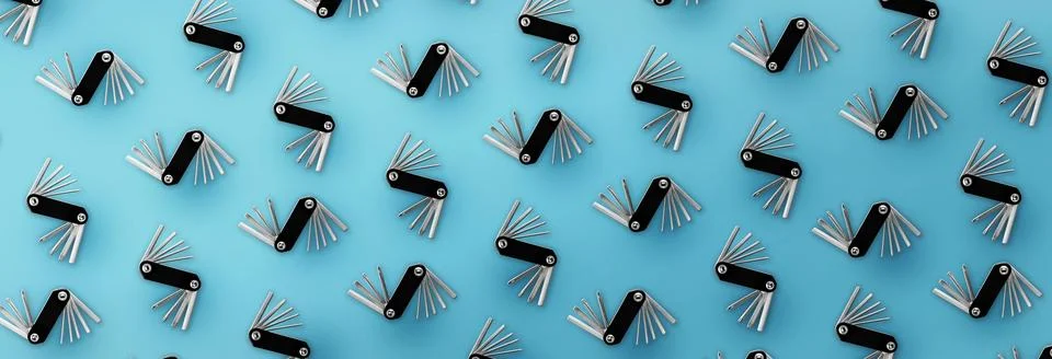 Pattern of bicycle repair tools on blue background. Stock Photos