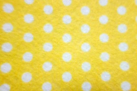 Pattern with big white polka dots on a yellow background Stock Photos