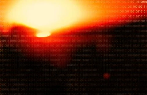 Pattern of binary numbers against defocused solar background 写真素材