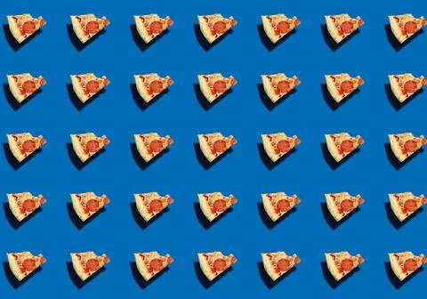 A pattern with a bitten pizza on a blue background. Food delivery. Stock Photos