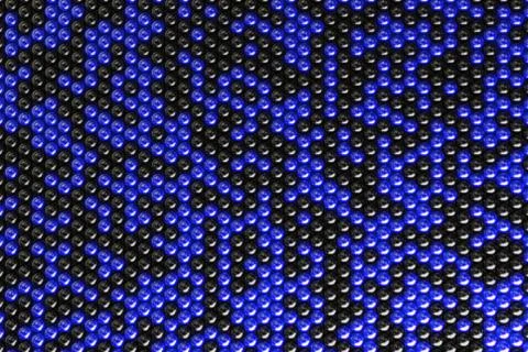 Pattern of black and blue spheres Stock Illustration