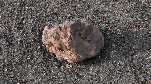 Pattern of black flickering volcanic sand texture. Volcano Stock Photos