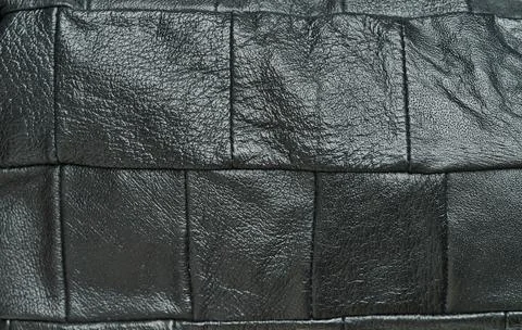 Pattern of black leather squares Foto stock