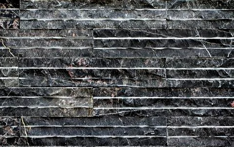 Pattern of black slate wall texture and background Stock Photos