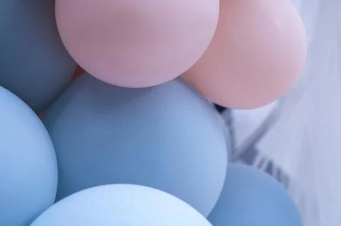 Pattern of blue and pink balloons forming a decorative textured background Stock Photos