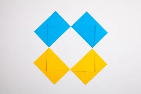 Pattern from blue and yellow envelopes 库存照片
