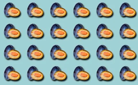 Pattern with blue plums on a blue background with a shadow. Stock Photos