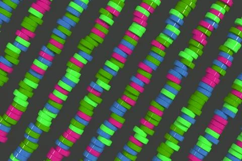 Pattern of blue, red and green cylinder tablets on black background Stock Illustration