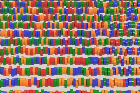 Pattern of blue, red and green cylinder tablets on white background Stock Illustration