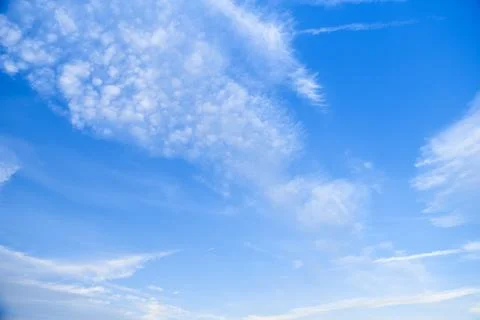Pattern of the blue sky with clouds Stock Photos
