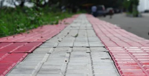 Pattern board empty tiles in front of blurred background. Perspective red and Stock Photos