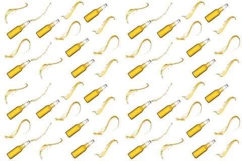 Pattern of bottle of beer and beer splashes isolated on white background Stock Photos