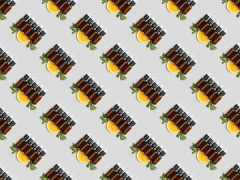 Pattern bottles essential oil orange Stock Photos